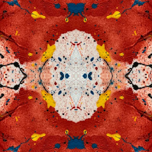 Abstract action painting wallpaper with vibrant red, blue, and yellow splashes in a mirror symmetry repeat.
